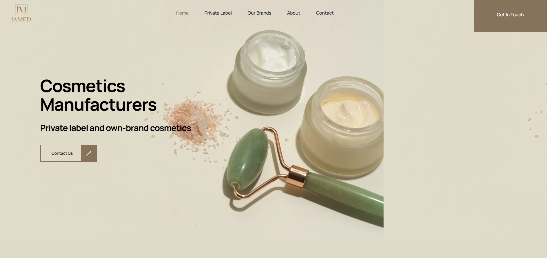 Cosmetics webpage featuring creams in jars with a jade roller and salt, highlighting private label and own-brand offerings.